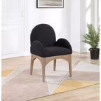 Sedia da pranzo con braccioli in tessuto bouclé nero/crema, 1 posto, gambe in frassino naturale